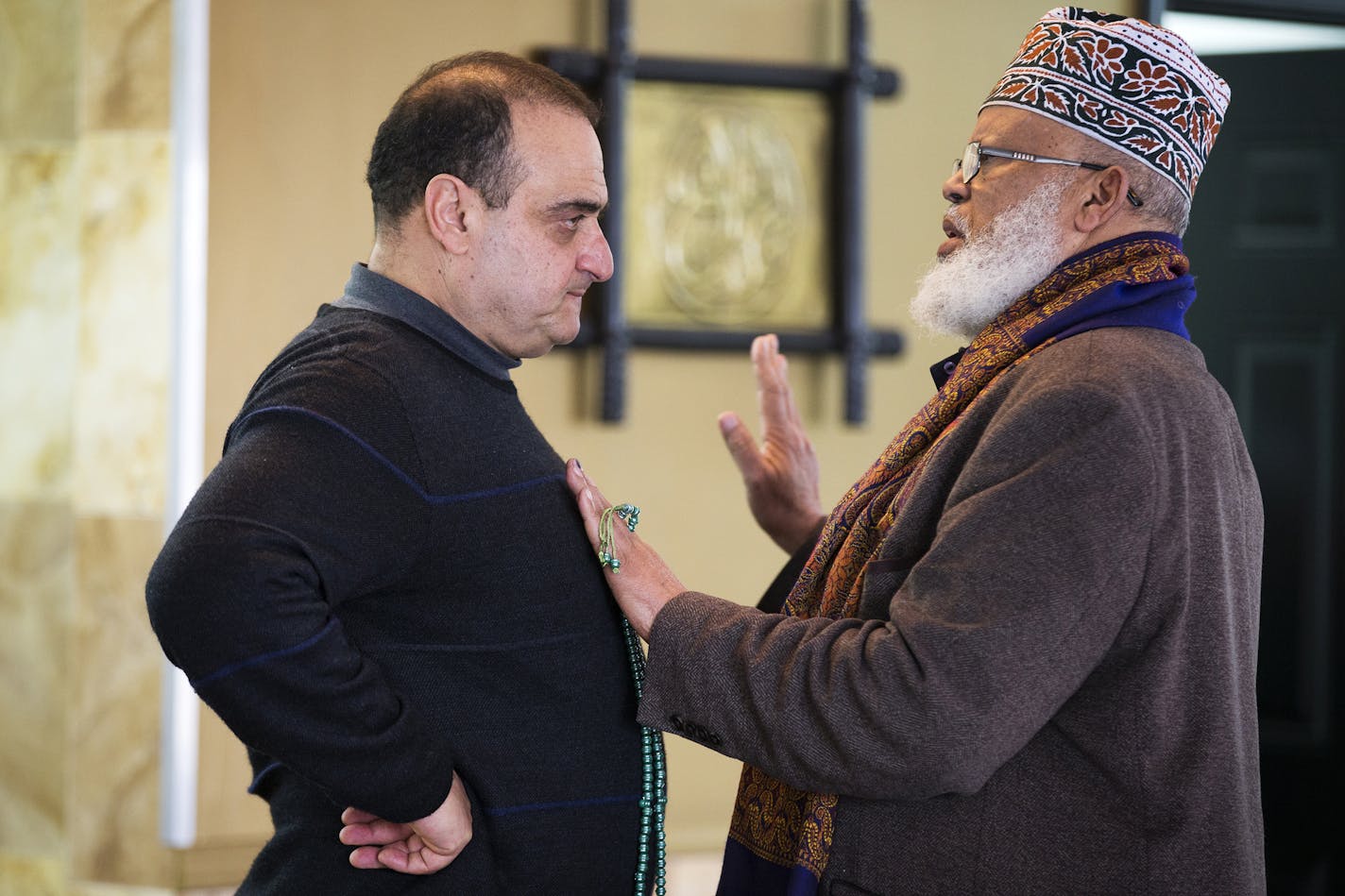 Karmel Mall owner Basim Sabri talks with Imaam Sheikh Sa'ad Musse Roble after Friday prayers at the new mosque inside Karmel Mall in Minneapolis on Friday, February 20, 2015. ] LEILA NAVIDI leila.navidi@startribune.com / BACKGROUND INFORMATION: The project to add an additional floor to Minneapolis' oldest Somali mall made news last year when part of the construction collapsed, cutting off electricity to neighboring businesses. Now, Basim Sabri, the Karmel Mall's owner, is showing off the newly c