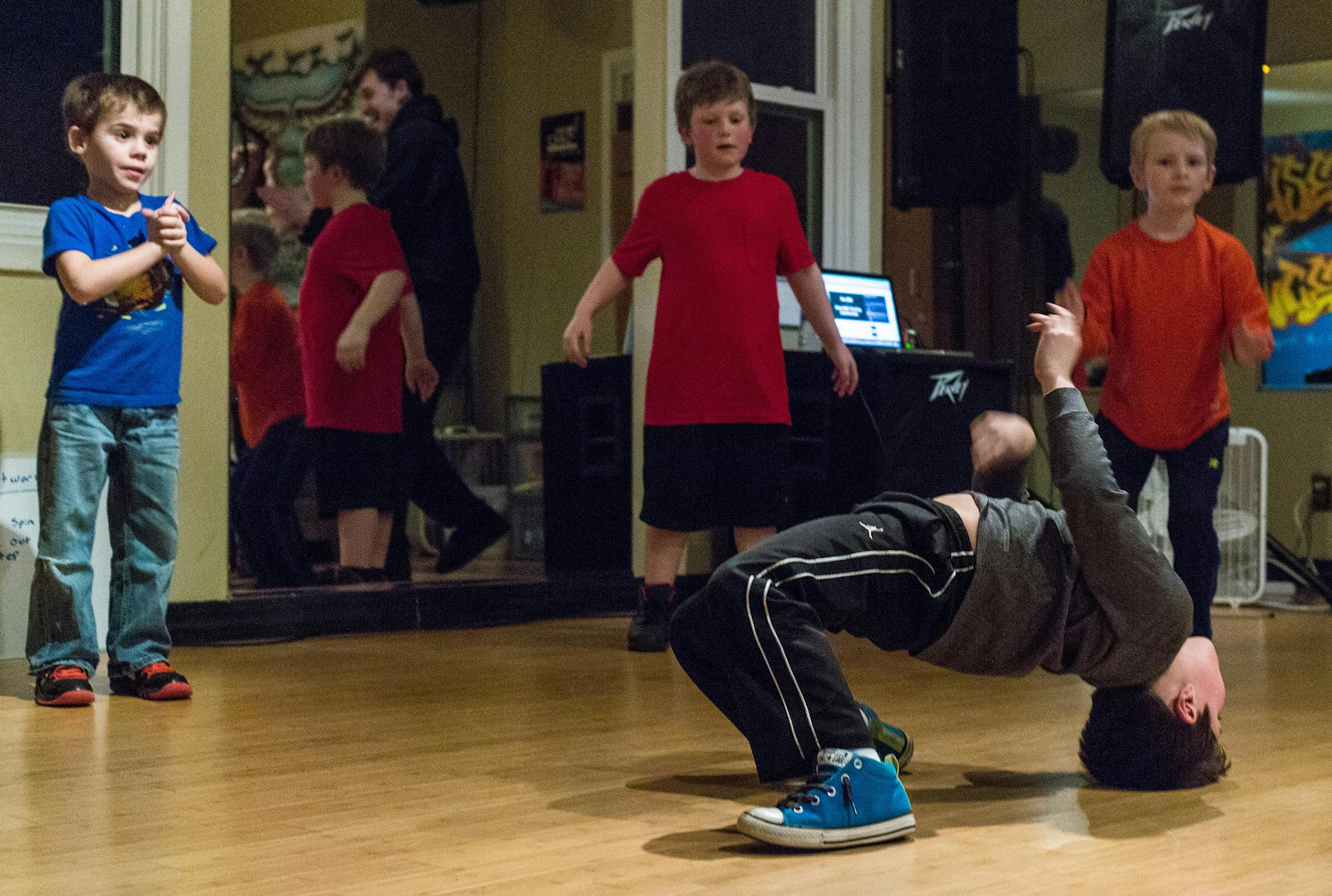 Paxton Mueller, age 7, dances during class at the House of Dance, Feb. 26. ] Elizabeth Brumley special to the Star Tribune * In a tiny walk-up studio on the back streets of Hopkins, a little slice of the 80s is lovingly preserved and passed on. The House of Dance teaches breakdancing -- a dance form that evokes images of MC Hammer parachute pants and spray-painted New York subway car.