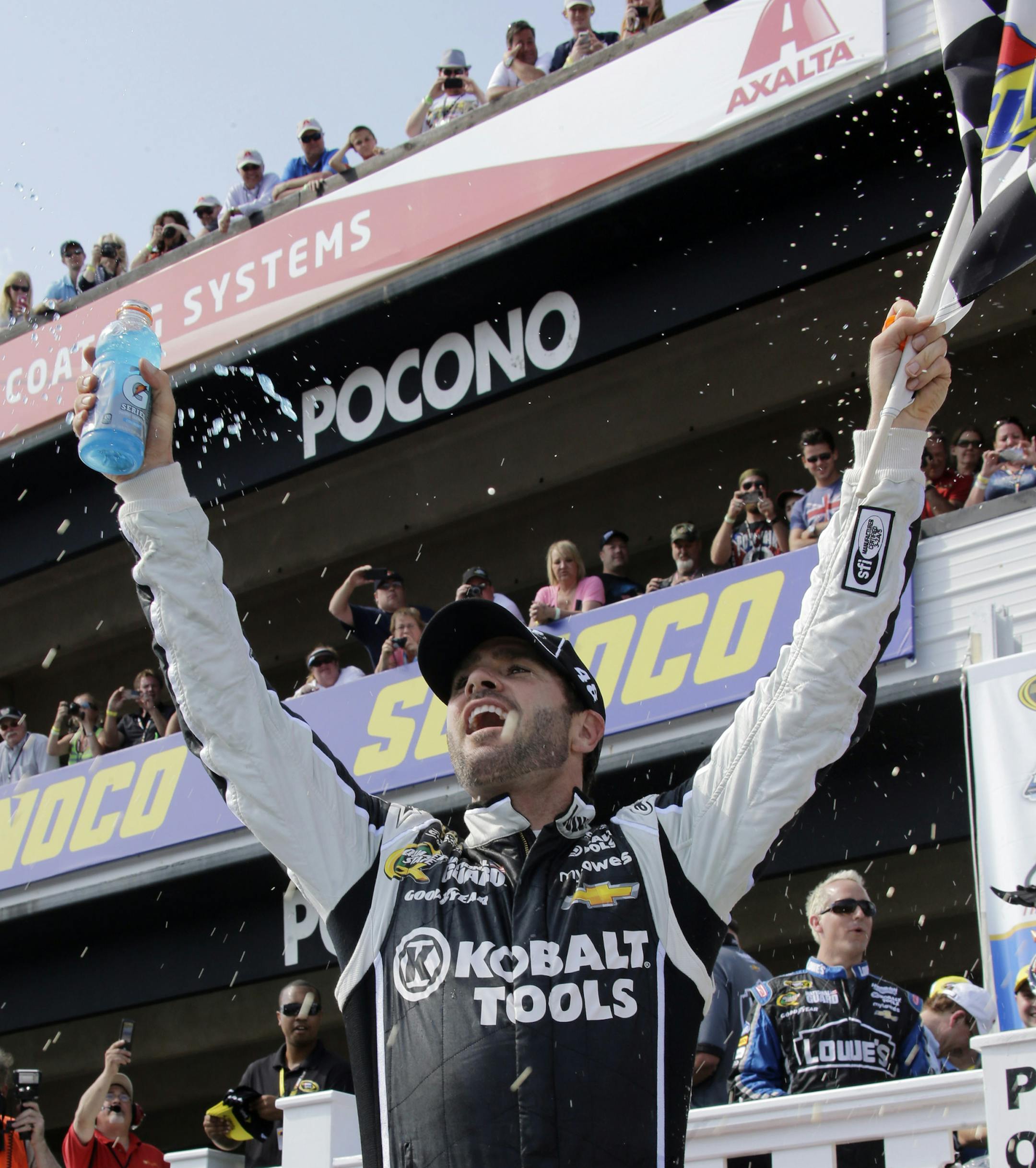 Jimmie Johnson celebrated in Victory Lane after winning the NASCAR Pocono 400 on June 9.