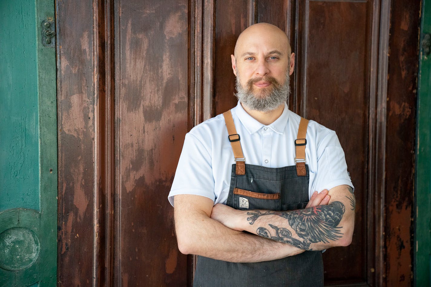 Jorge Guzman, chef and owner of Petite León, poses for a portrait.