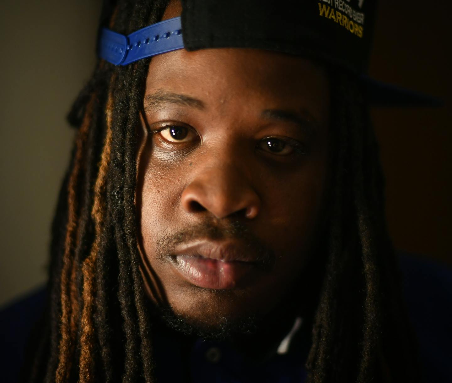 Demario Jefferson stood for a portrait in September. ] (AARON LAVINSKY/STAR TRIBUNE) aaron.lavinsky@startribune.com A closer look at gang culture in Minneapolis, focusing on the story of one North Side gang leader who's reached a crossroads in his life: following several stints in prison, the death of his mother and birth of several children, he yearns for a normal life. But, he still feels the pull of street life, and has been reluctant to distance himself from friends and family members who st