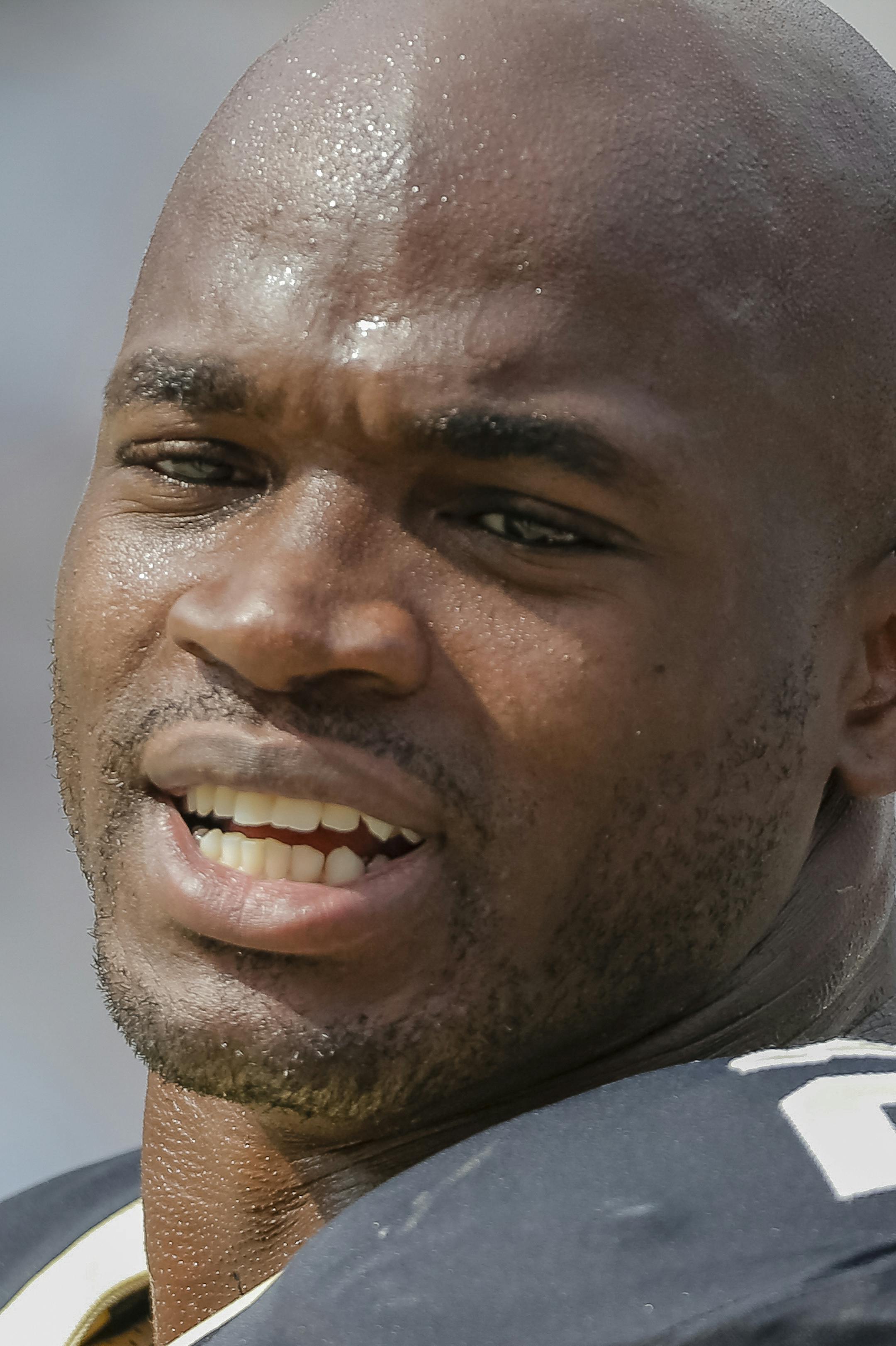 FILE - In this Sept. 24, 2017, file photo, New Orleans Saints' Adrian Peterson (28) is shown on the sidelines during the second half of an NFL football game against the Carolina Panthers, in Charlotte, N.C. The Arizona Cardinals, with the worst rushing game in the NFL, have acquired running back Adrian Peterson from the New Orleans Saints in exchange for an undisclosed 2018 draft pick. (AP Photo/Bob Leverone, File)