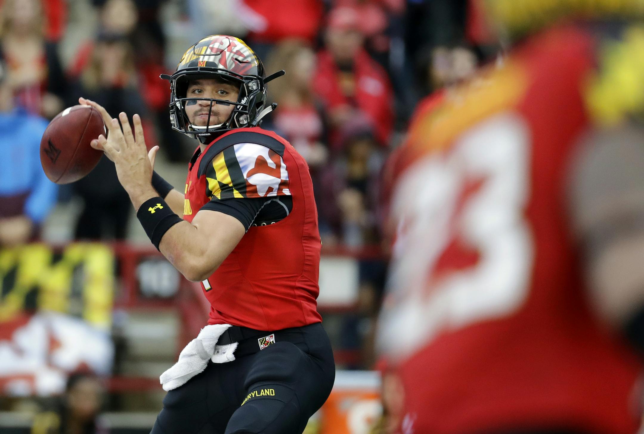 FILE - In this Saturday, Oct. 1, 2016, file photo, Maryland quarterback Perry Hills throws to a receiver in the first half of an NCAA college football game against Purdue in College Park, Md. Coming off a season in which he threw 13 interceptions, Hills has done a masterful job of running unbeaten Maryland's high-powered offense. (AP Photo/Patrick Semansky, File)