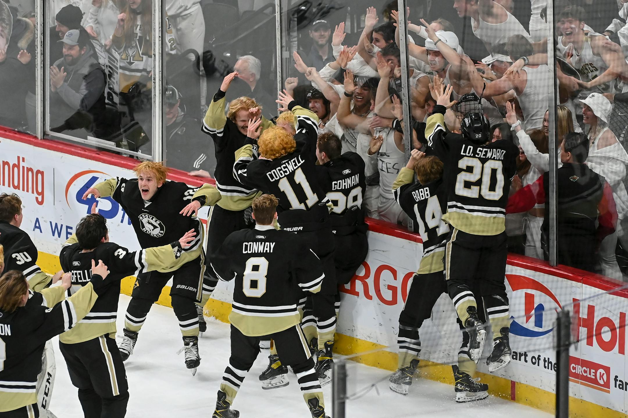 Andover players celebrate their 6-5 win against Maple Grove after the second overtime in the Class 2A Boys Hockey State Championship Game Saturday, March 12, 2022 at the Xcel Energy Center in St. Paul, Minn. ] AARON LAVINSKY • aaron.lavinsky@startribune.com