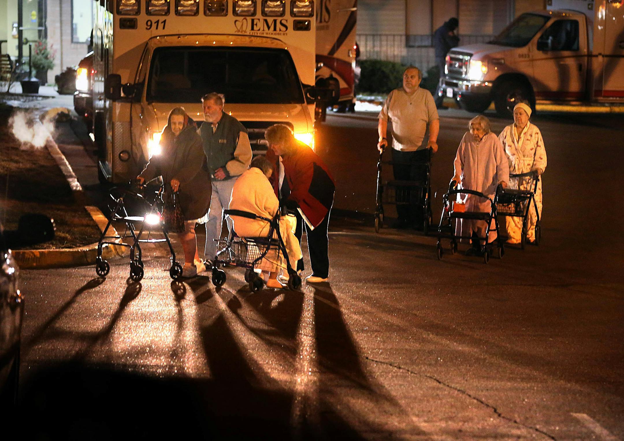 A fire was reported in a Woodbury senior complex in Woodbury in the 7000 block of Lake Rd. just after 4 a.m. according to Woodbury Fire Chief Todd Johnson. Heavy smoke filled the first floor. Fire was extinguished. Mutual aid from nearby fire departments helped with the fire. More than a dozen ambulances responded. Residents were evacuated from the building. ] JIM GEHRZ � james.gehrz@startribune.com / Woodbury, MN / March 28, 2015 /4:45 AM