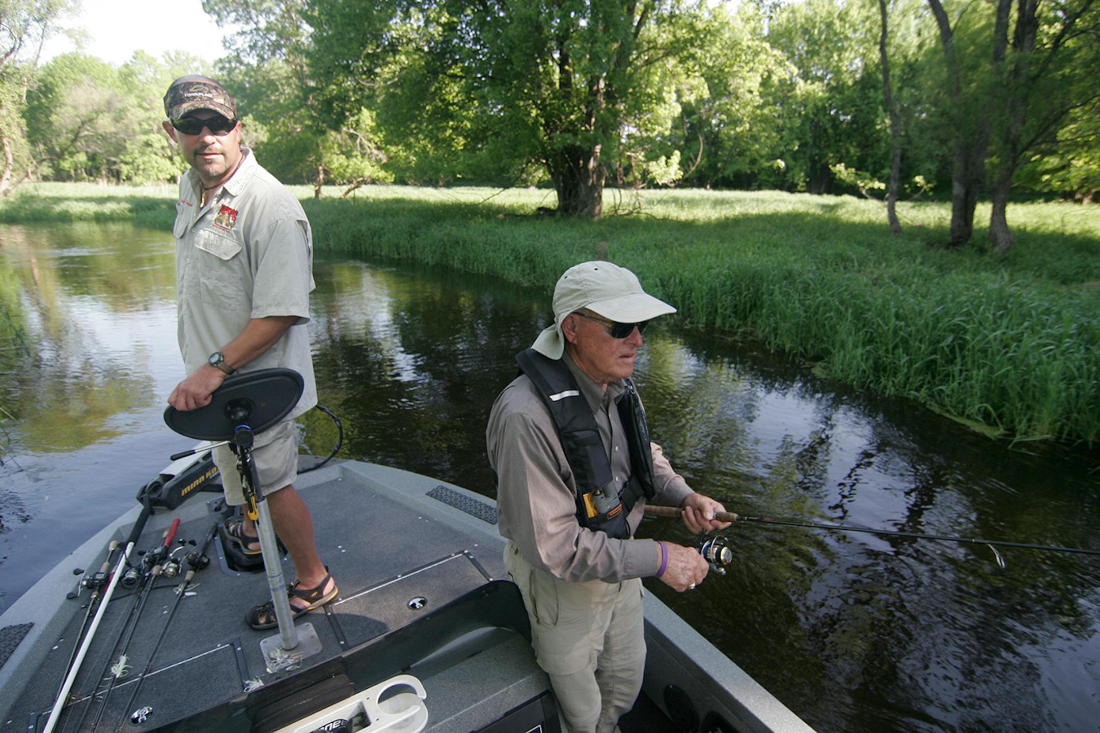 Eric Altena of St. Cloud, a member of the Upper Mississippi River Smallie Club, guided Swede Anderson, 82, of Rochester, a Korean War veteran, on a fishing outting Friday, part of Trolling for the Troops event at Camp Ripley. Guides, anglers and professional anglers volunteered for the event. "It's a great opportunity to say thanks,'' Altena said.