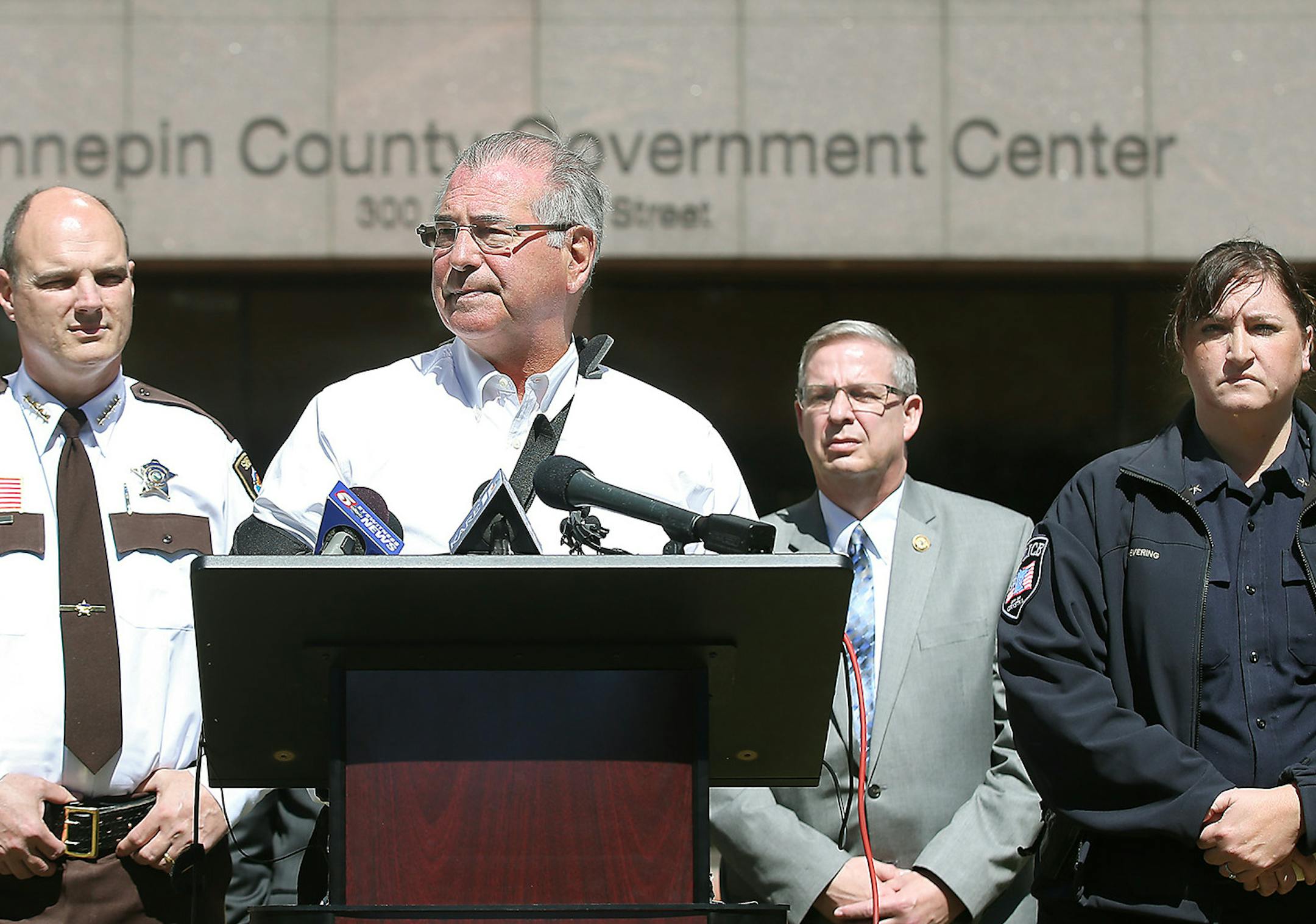 Hennepin County Attorney Mike Freeman, with Hennepin County Sheriff Rich Stanek to his left, and Crystal Police Chief Stephanie Revering on his right, announced the charges against Pierre Collins during a press conference at the Hennepin County Government Center, Tuesday, April 14, 2015 in Minneapolis, MN. ] (ELIZABETH FLORES/STAR TRIBUNE) ELIZABETH FLORES • eflores@startribune.com