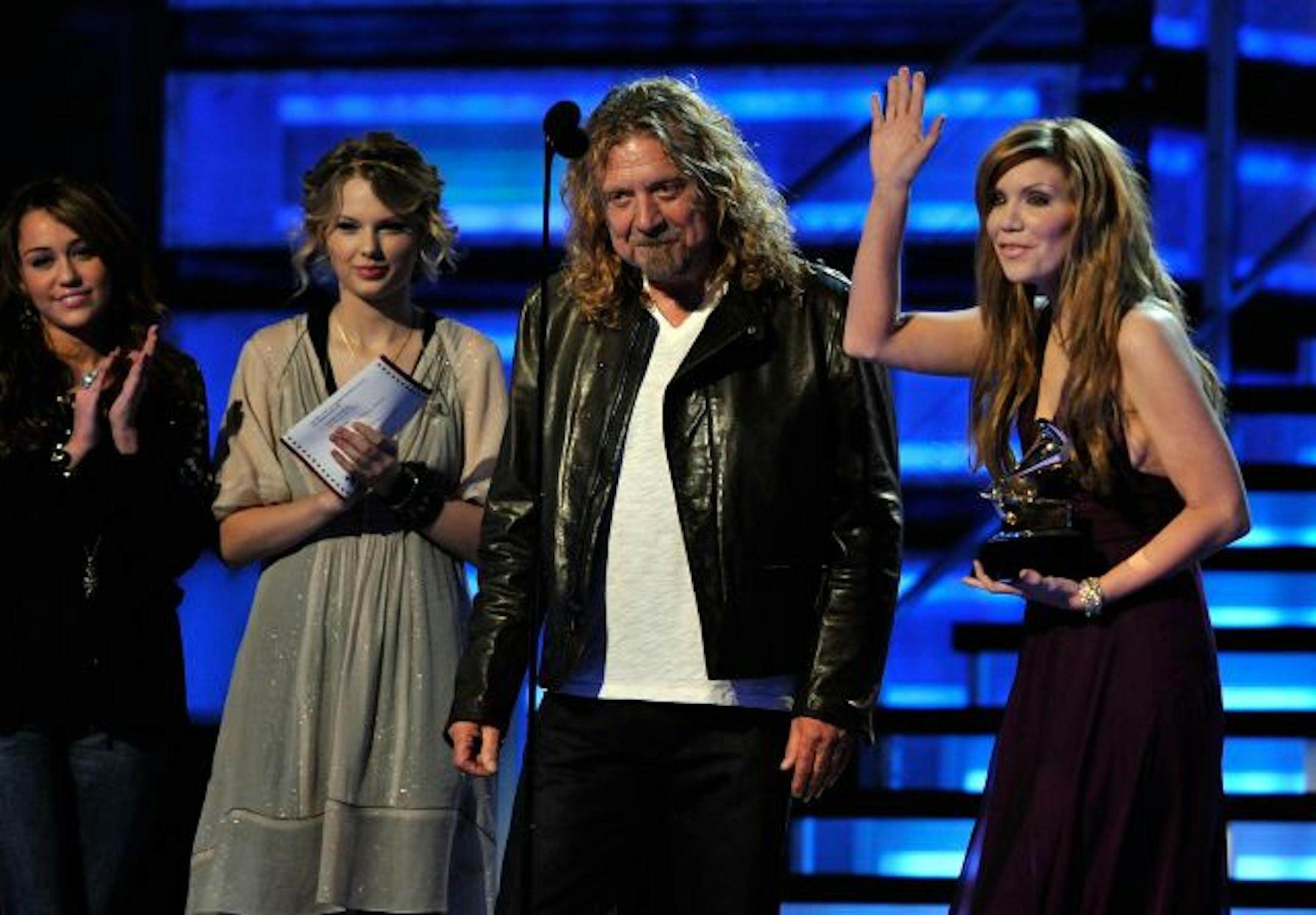 LOS ANGELES, CA - FEBRUARY 08: Singers Miley Cyrus and Taylor Swift present the Best Contemporary Folk/Americana Album award to Robert Plant and Alison Krauss during the 51st Annual Grammy Awards held at the Staples Center on February 8, 2009 in Los Angeles, California.