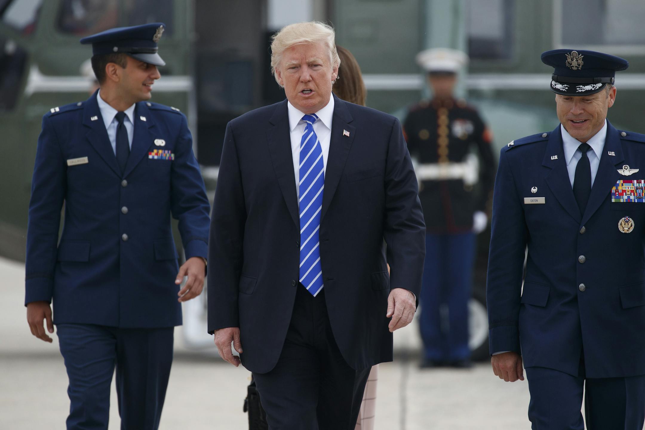 President Donald Trump walks to board Air Force One for a trip to Poland and Germany, Wednesday, July 5, 2017, at Andrews Air Force Base, Md. (AP Photo/Evan Vucci)