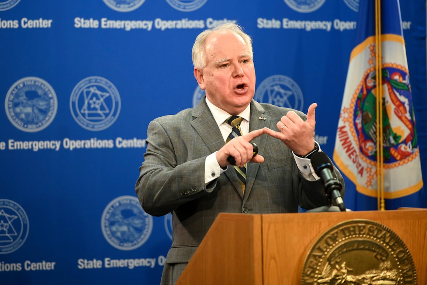 Minnesota Gov. Tim Walz, shown Thursday, acknowledged that the website and testing clinics are a work in progress.