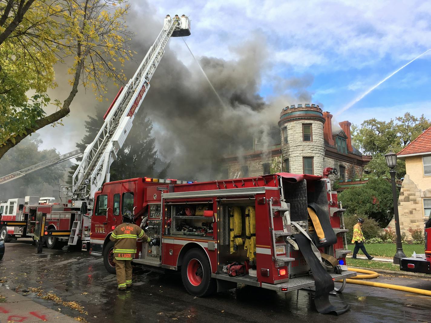 Firefighters worked to extinguish a fire in an historic home near the St. Paul Cathedral.