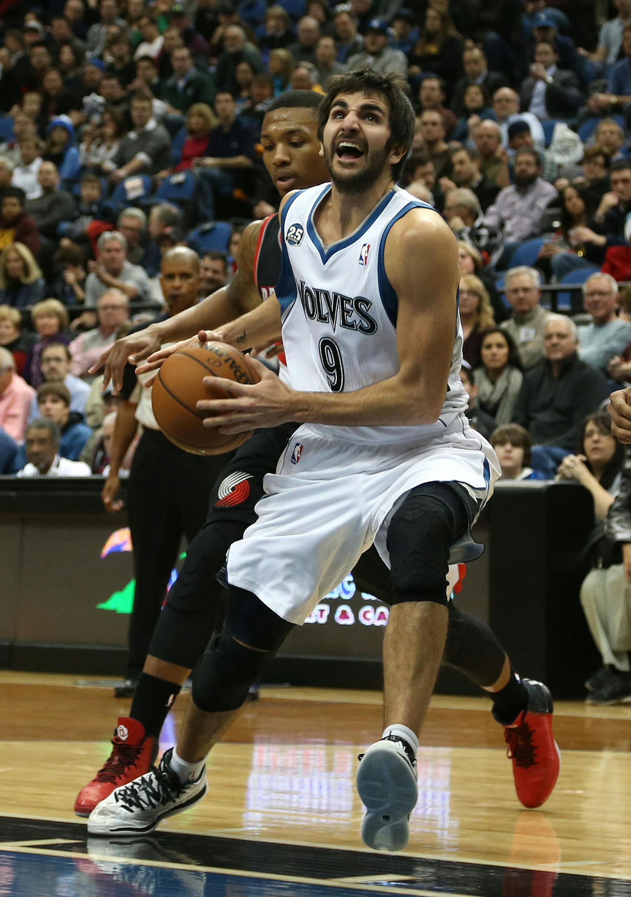 Wolves Ricky Rubio split the two Portland defenders and headed to the basket during the first half at the Target Center in Minneapolis Wednesday, December 18, 2013. ] (KYNDELL HARKNESS/STAR TRIBUNE) kyndell.harkness@startribune.com