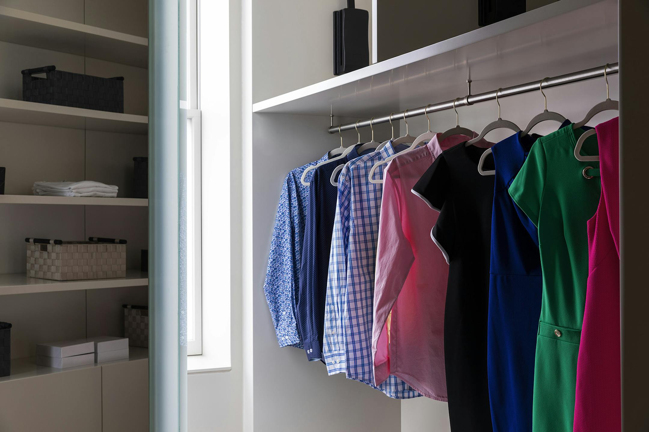Organizing clothing in color categories or from light to dark can help with organization. (Design Recipes/TNS)