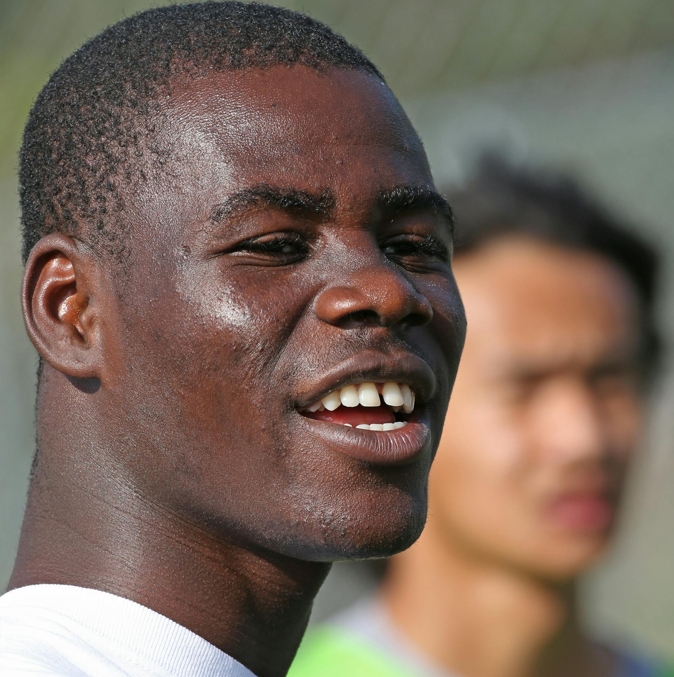 (left to right) Prairie Seeds Academy soccer player Mualigbe Keita during practice at the school on 9/6/13. Prairie Seeds Academy is attempting to rebrand its athletics with a new athletic director and new direction, espeically in soccer. The boys' soccer program has been tangled up in controversy over each of the last three years and was disqualified from last year's state tournament.] Bruce Bisping/Star Tribune bbisping@startribune.com Mualigbe Keita/source.