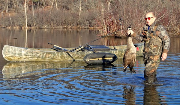 Wendell Diller retrieved a Canada goose &#x2014; a Christmas goose &#x2014; felled Wednesday morning during an atypically warm hunt.