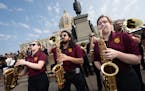 The University of Minnesota marching band kicked off the bill signing party Wednesday in St. Paul.