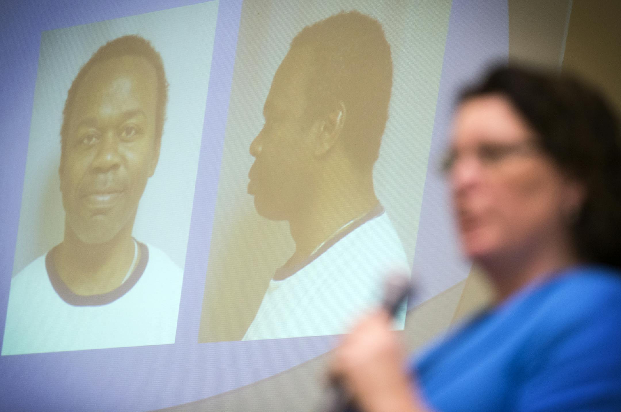 Dr. Elizabeth Barbo, director of reintegration at the Minnesota Sex Offender Program speaks during a predatory offender community notification public meeting at Lutheran Church of the Redeemer in St. Paul on Wednesday, February 10, 2016. A photo of the predatory offender Oliver Dority is shown on the screen behind her. ] (Leila Navidi/Star Tribune) leila.navidi@startribune.com BACKGROUND INFORMATION: During a predatory offender community notification meeting, neighbors were notified that a preda
