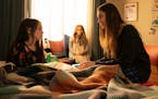 Violet McGraw, left, as Cady, M3GAN and Allison Williams as Gemma in "M3GAN," directed by Gerard Johnstone. (Geoffrey Short/Universal Pictures/TNS) OR