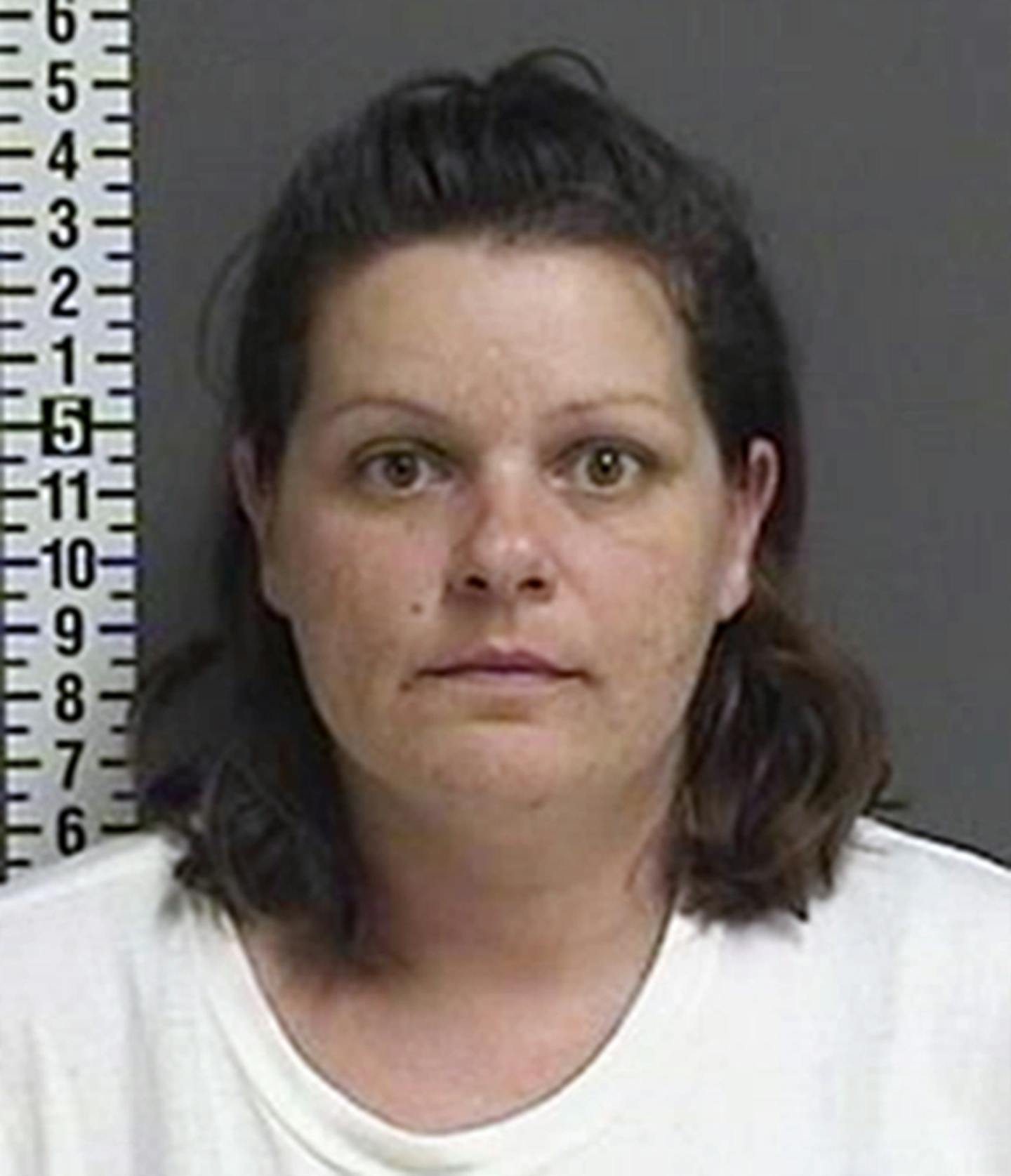 This photo provided by the Cass County Sheriff's Office in Fargo, N.D., shows Brooke Crews, one of two suspects charged with conspiracy to commit murder and other counts Monday, Aug. 28, 2017, in connection with the death of a pregnant woman in North Dakota. Authorities recovered the body of Savanna Greywind, from the Red River in Fargo. The two suspects were neighbors of Greywind, who went missing Aug. 19. (Cass County Sheriff's Office via AP)