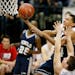 Jeremy Johnson of Champlin Park scored over Hunter Trautman of St. Francis in the first half. Champlin Park played St. Francis in 4A quarterfinal acti