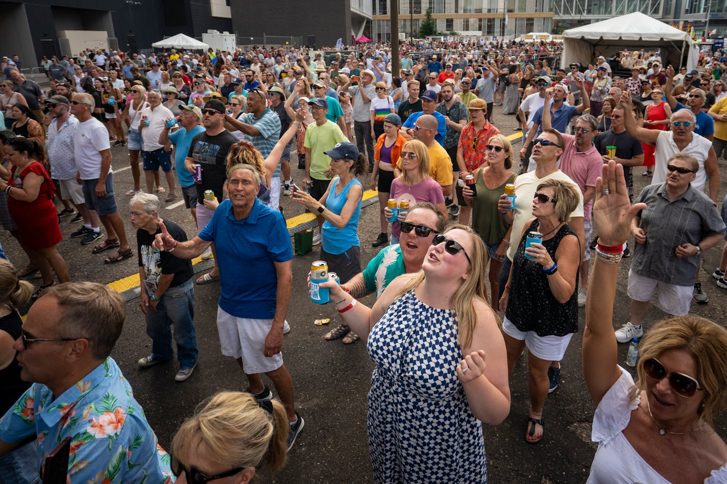 The crowd sings "Hey Jude" along with the Fabulous Armadillo's during their performance at the Taste of Minnesota in Minneapolis Sunday afternoon. This is the two day festival's first year back since 2015 and the first time in Minneapolis.