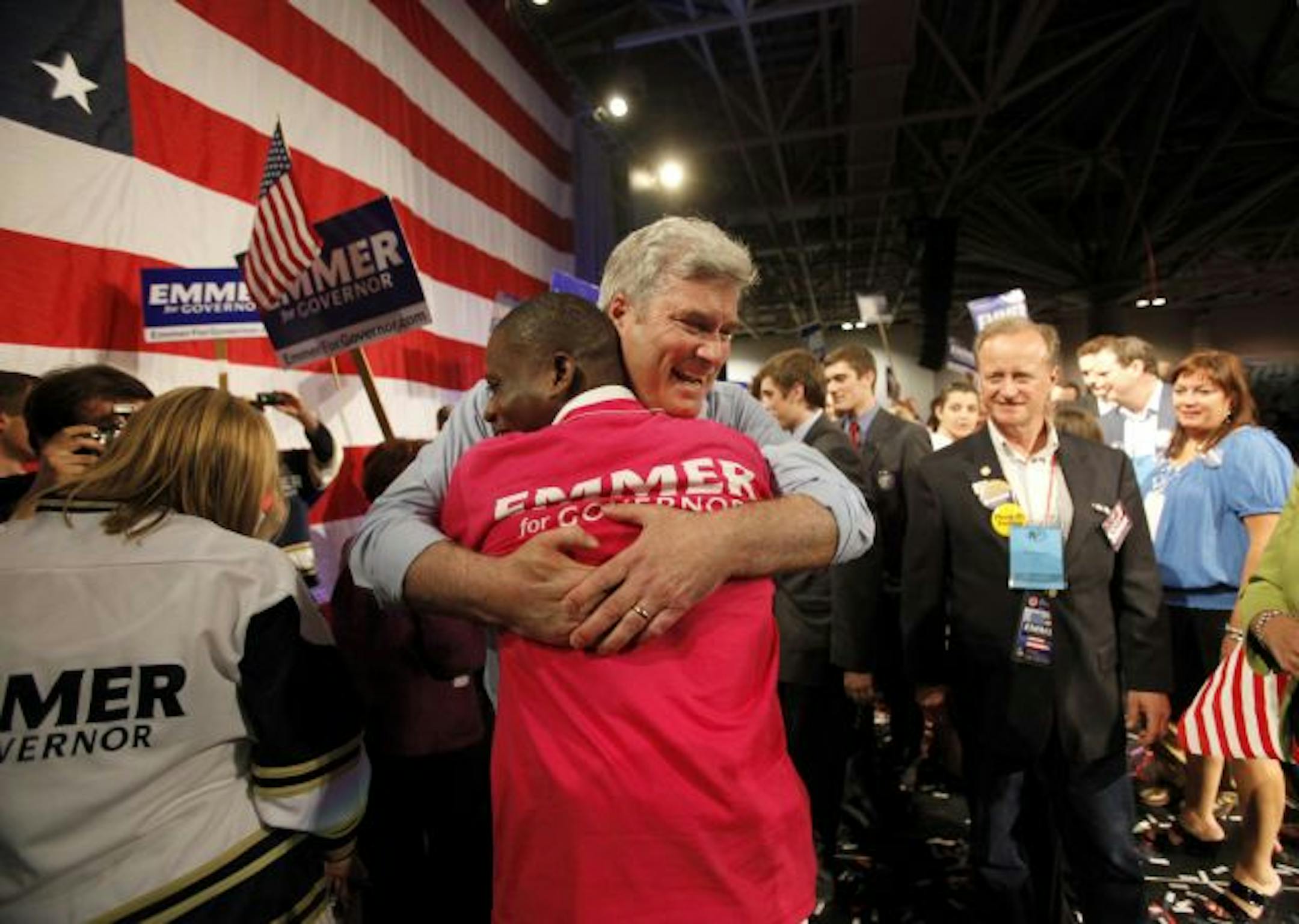 Tom Emmer hugs a supporter after his victory speech.