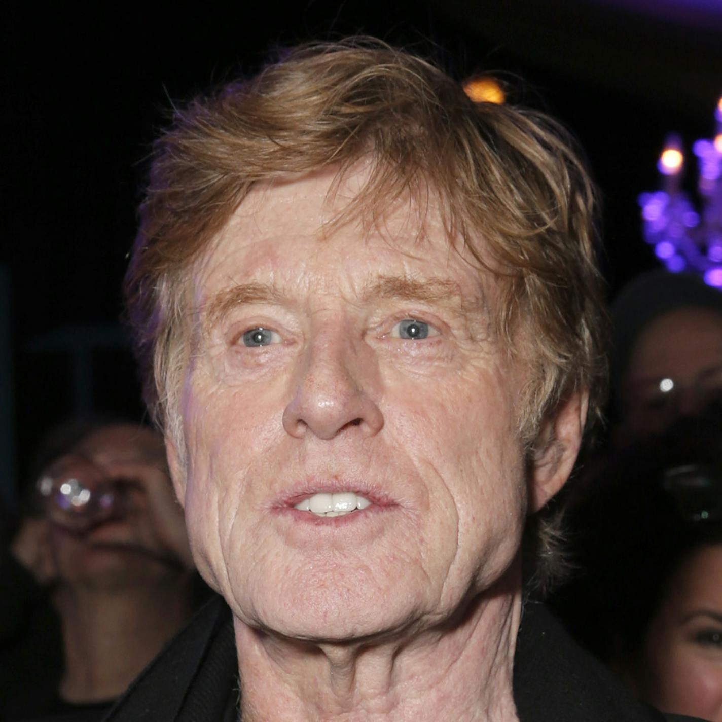 IMAGE DISTRIBUTED FOR HENNESSY - Robert Redford toasts with Paradis Imperial ay the Hennessy Privilege VIP post-party at the Santa Barbara International Film Festival after receiving the American Riviera Award at the Arlington Theatre on Friday, Feb. 7, 2014 in Santa Barbara, Calif. (Photo by Todd Williamson/Invision for Hennessy/AP Images)