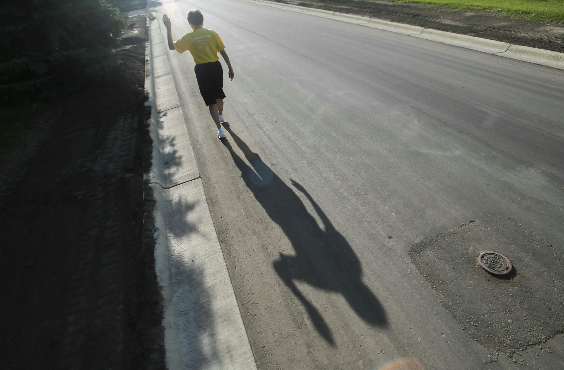 Joan Monson gestures while out on her daily walk Thursday, July 24, 2014, in Golden Valley, MN. (DAVID JOLES/STARTRIBUNE) djoles@startribune On the day her husband was buried, Joan Monson went for a walk. There was nothing unusual about that. On the contrary, it would have been unusual had she not. Monson has walked three miles a day every day for 20 years, in the process walking through rain, snow, a polar vortex, heat waves and even heartbreak.