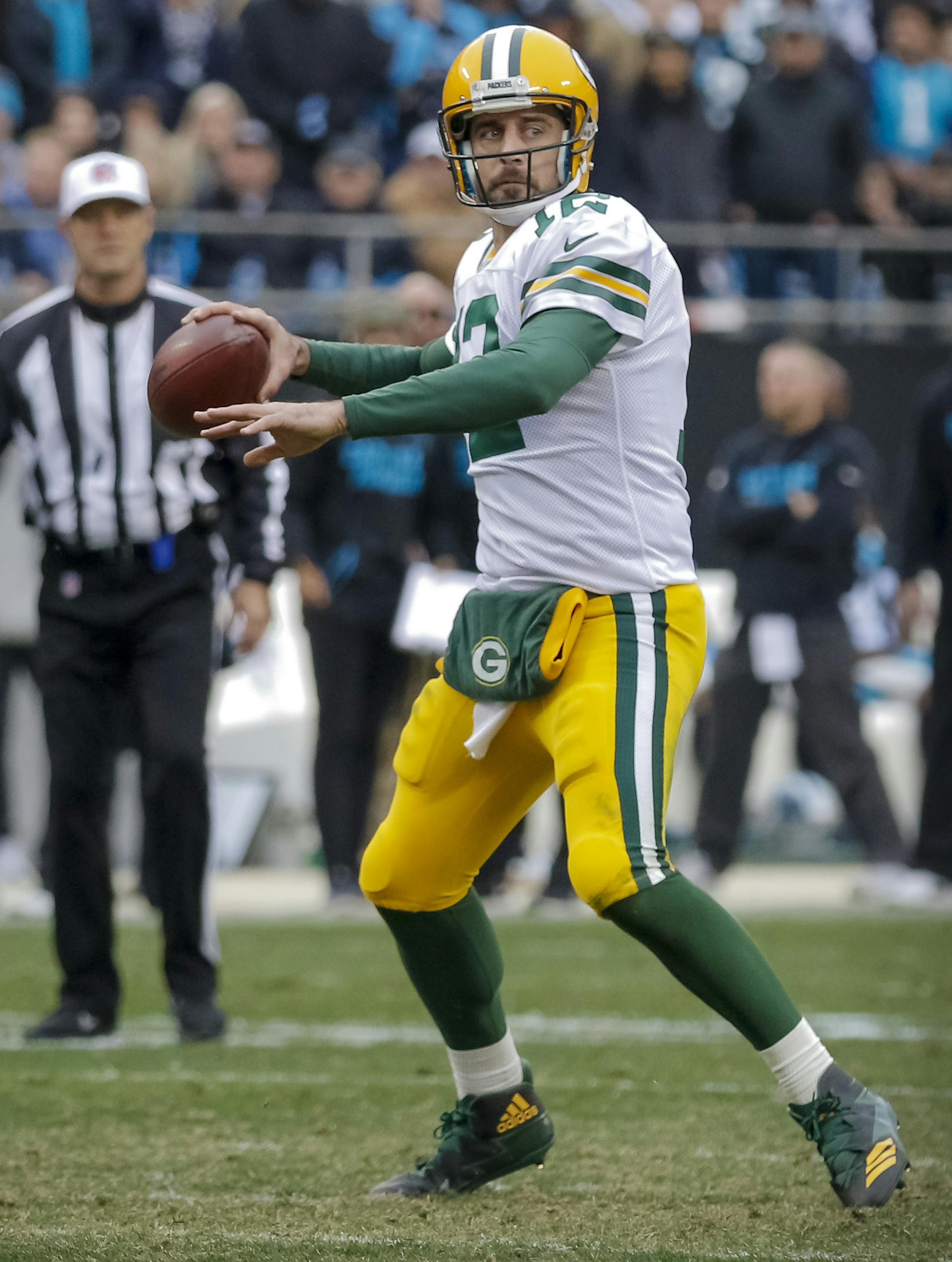 Green Bay Packers' Aaron Rodgers (12) looks to connect to an open receiver during the second half of an NFL football game against the Carolina Panthers in Charlotte, N.C., Sunday, Dec. 10, 2017. The Panthers won 31-24. (AP Photo/Bob Leverone) ORG XMIT: OTKBL131