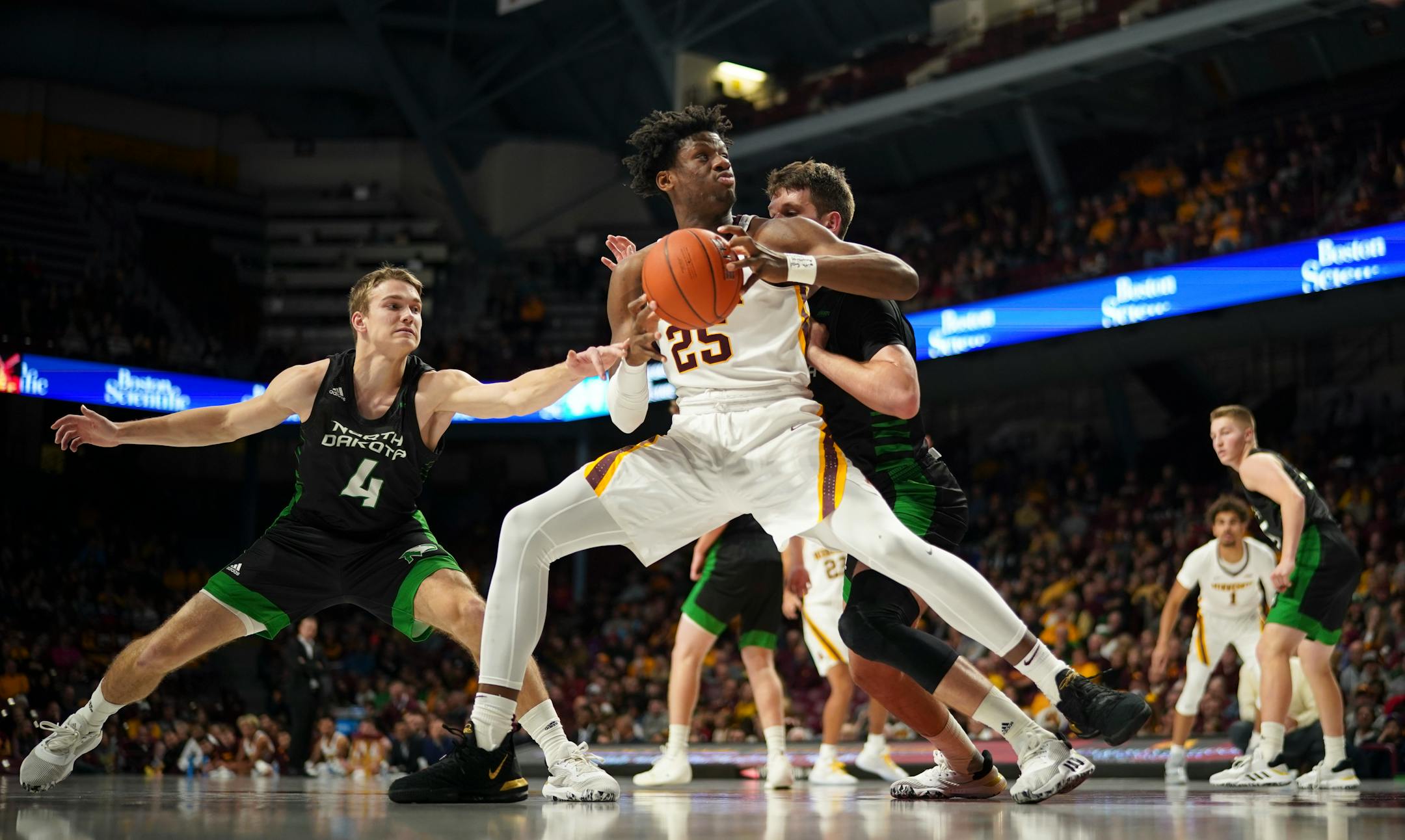 Gophers center Daniel Oturu leads the Big Ten in rebounding and is second in scoring.