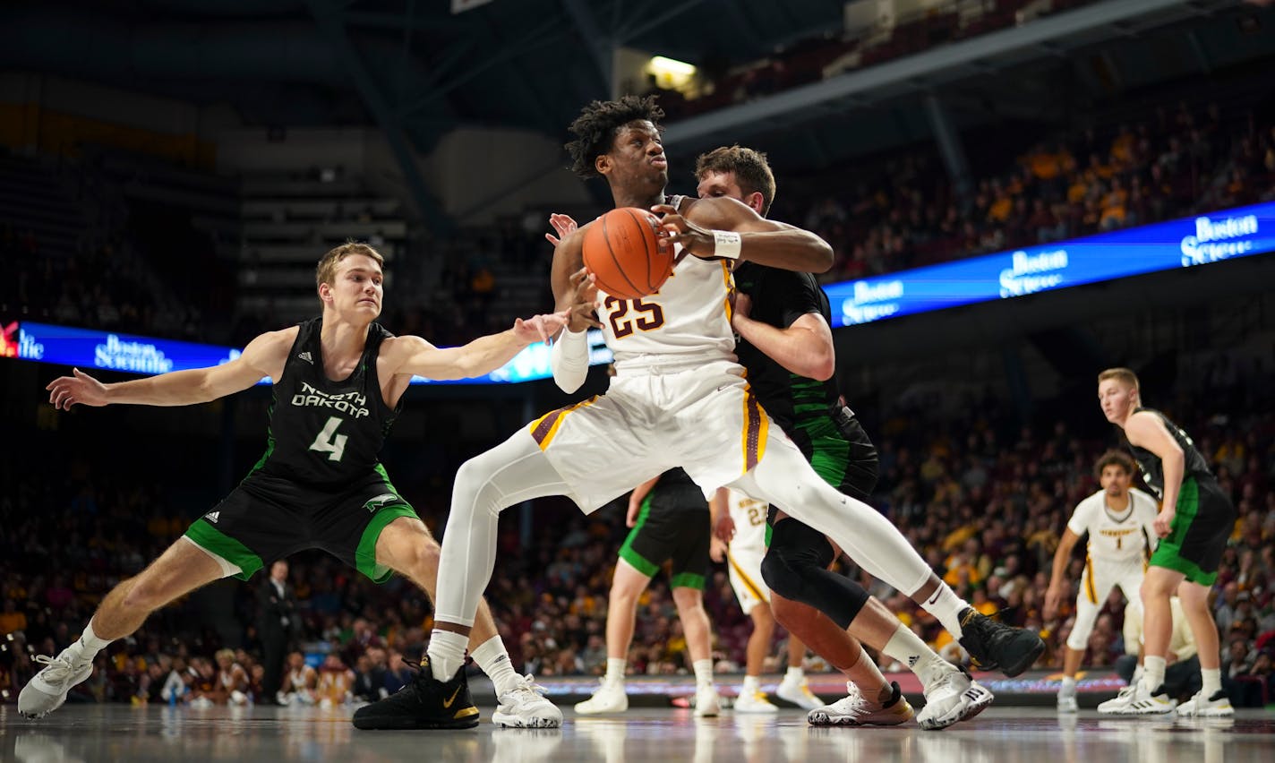 Gophers center Daniel Oturu leads the Big Ten in rebounding and is second in scoring.