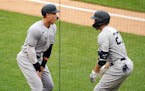 Giancarlo Stanton, right, celebrates his three-run, third-inning homer, snapping his monthlong home-run drought, with fellow Yankee Aaron Judge on Wed