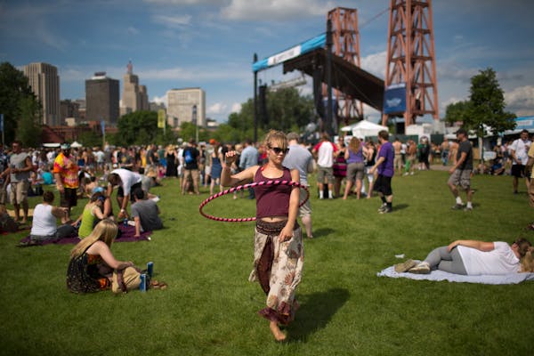 Michelle Anthony of Eau Claire danced to Polica as they performed at the River's Edge Music Festival on St. Paul's Harriet Island in June 2012.
