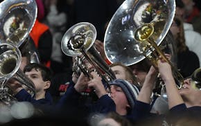 The Rochester Century/John Marshall team didn't last; the image of the band lives on.