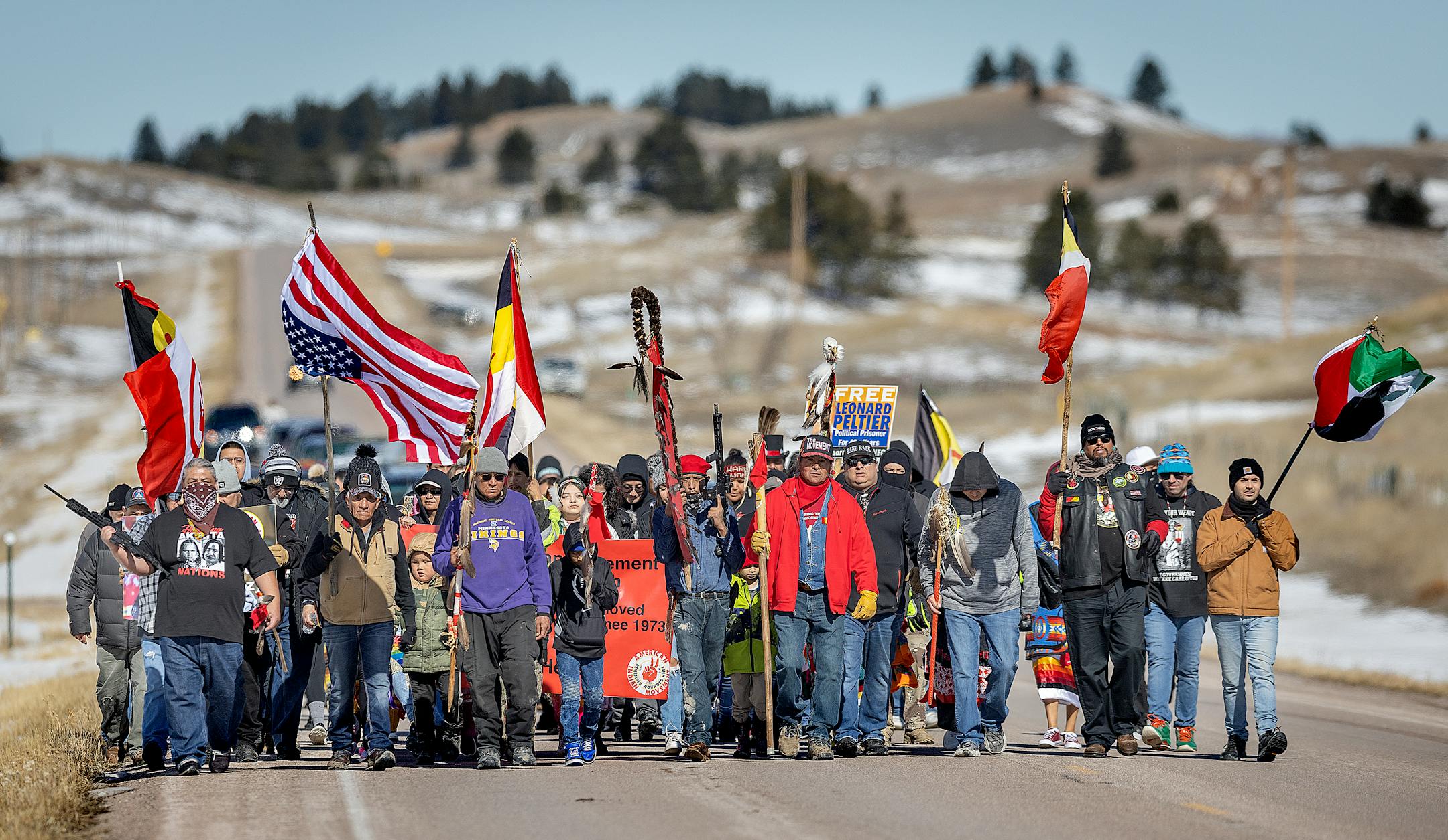 American Indian Movement members and supporters join the Four Directions March to honor the AIM Warriors of Wounded Knee of 1973 in Wounded Knee, SD on the 50th anniversary.