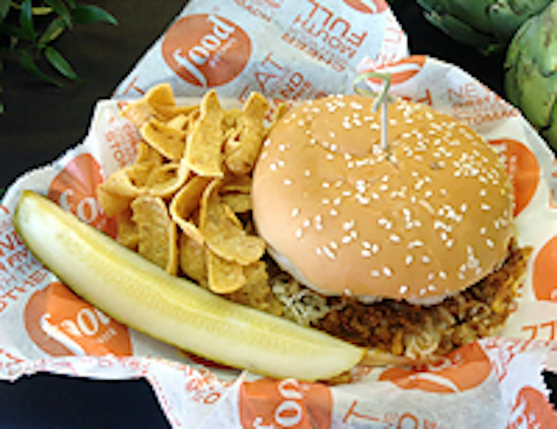 Bacon Sloppy Joes drives a hard liner past the diving third baseman