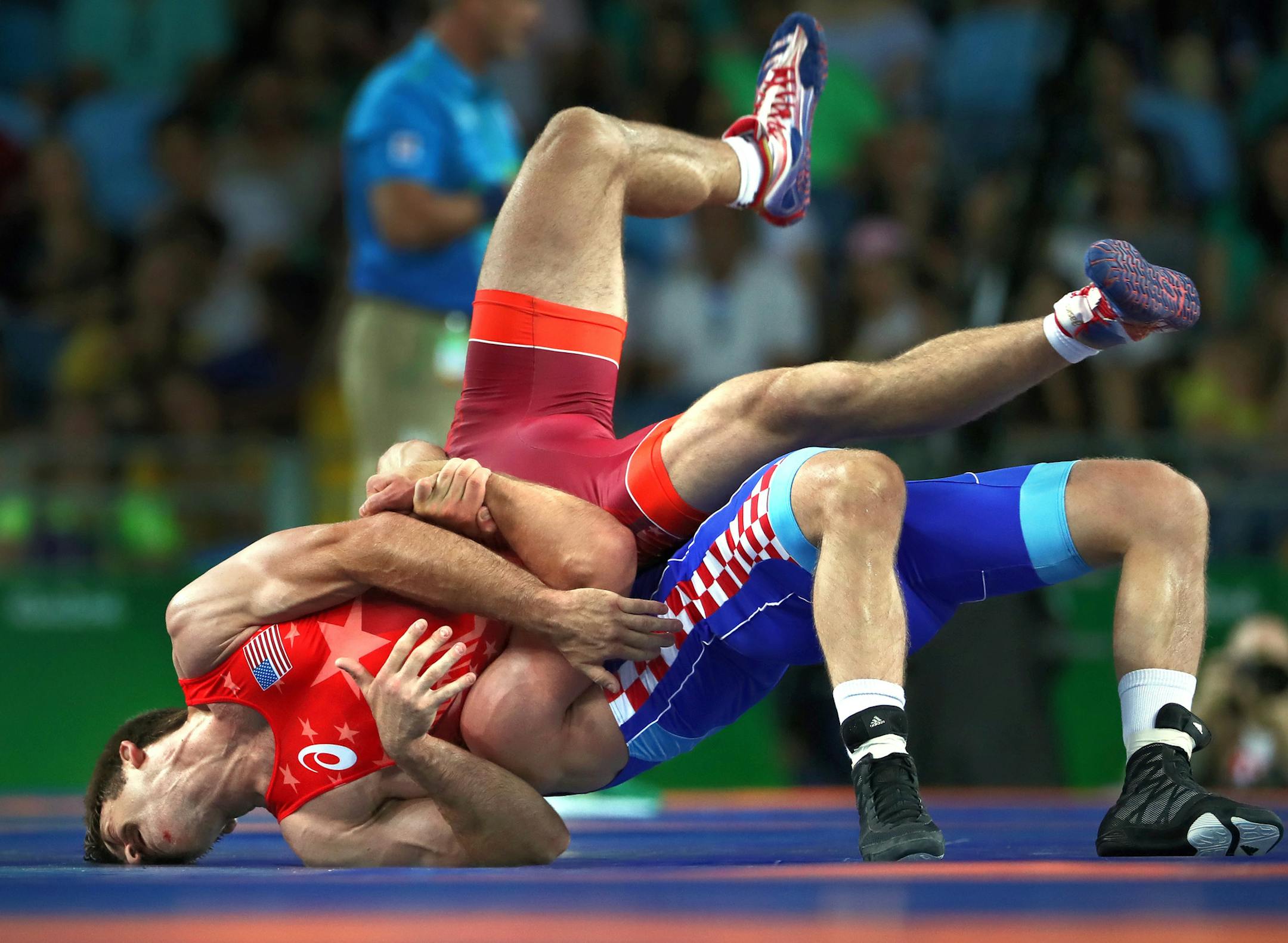 Andy Bisek of Chaska won his first match at the Olympics on Sunday, beating Yurisandi Hernandez Rios of Cuba 1-0 in the Greco-Roman 75-kilogram (165 pounds) division at Carioca Arena 2. Unfortunately Bisek lost his second match (Shown here) to Bozo Starcevic of Croatia in the quarterfinal match. ] 2016 Summer Olympic Games - Rio Brazil brian.peterson@startribune.com Rio de Janeiro, Brazil - 08/14/2016