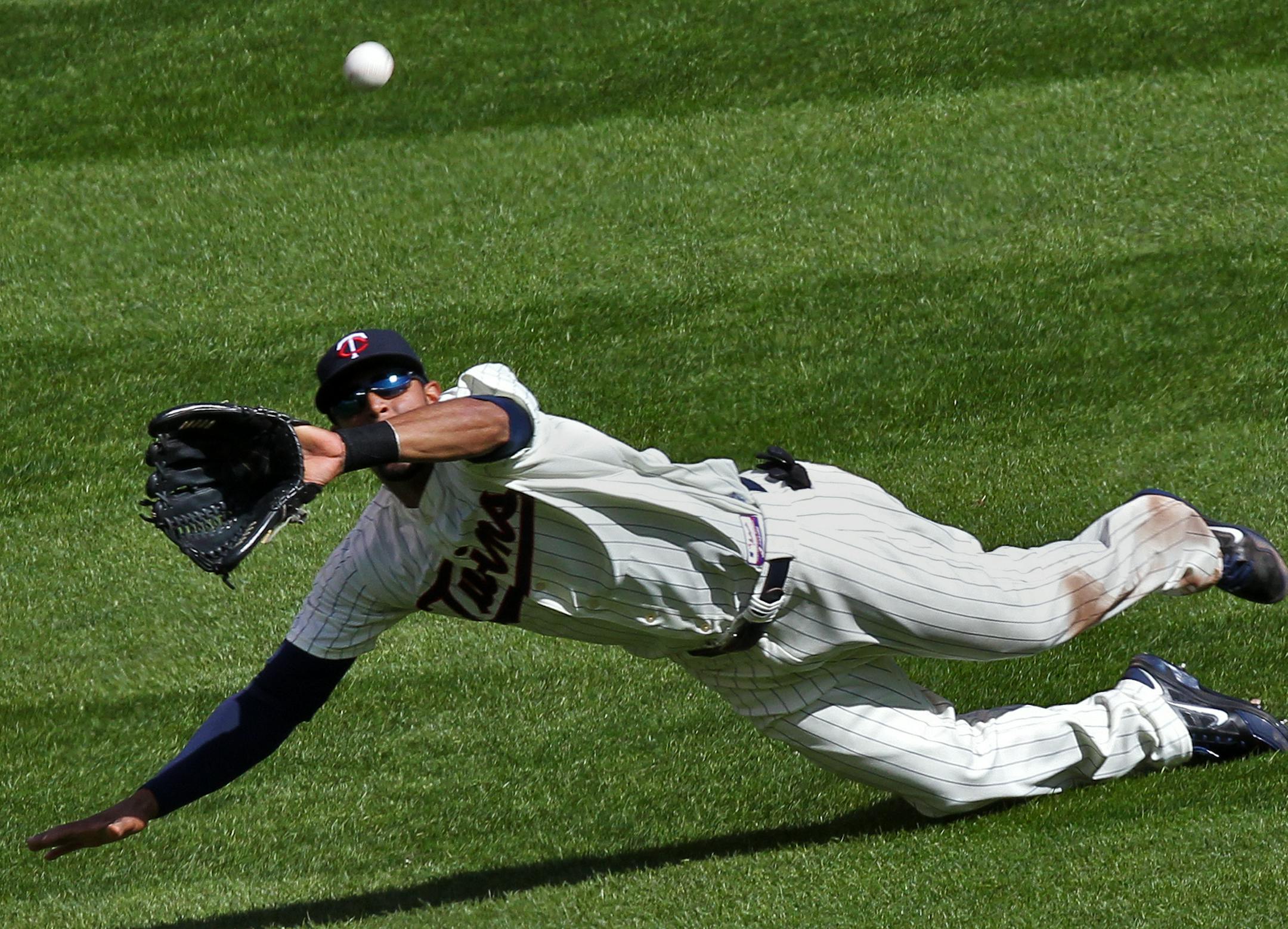 Minnesota Twins vs. Texas Rangers. Twins centerfielder Aaron Hicks made a diving catch of A.J. Pierzynski's at bat in 4th inning action. (MARLIN LEVISON/STARTRIBUNE(mlevison@startribune.com (cq program )