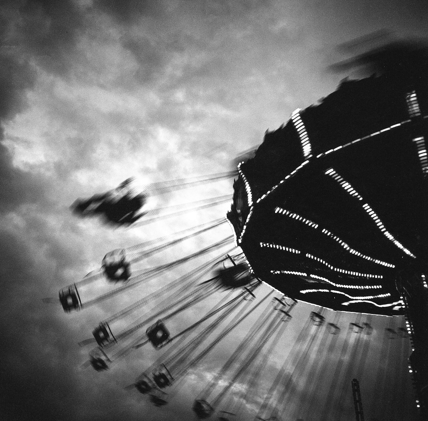 Fairgoers enjoyed the giant swing ride at the Minnesota State Fair on Thursday, August 26, 2021. ]