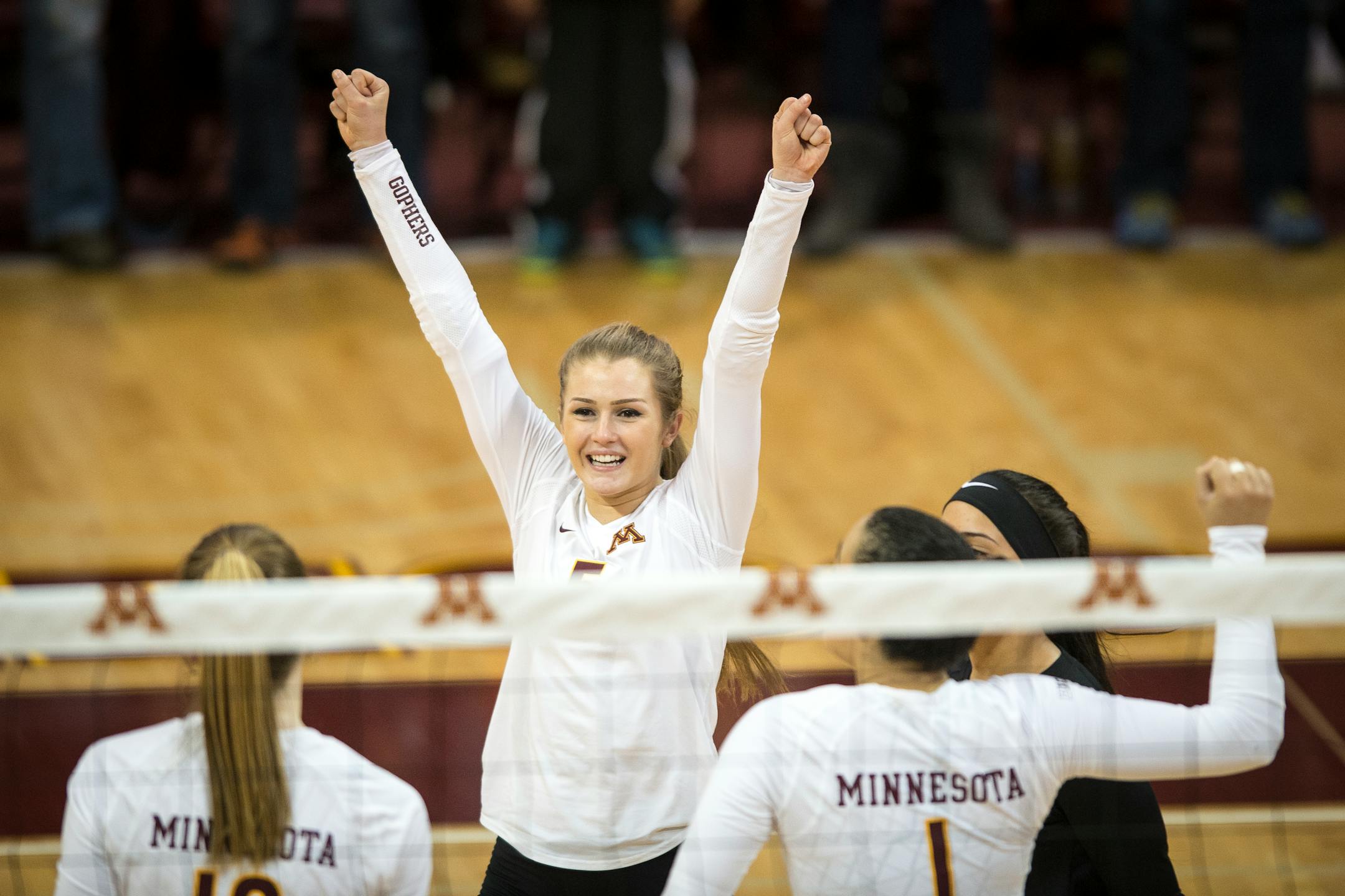 Minnesota outside hitter Alyssa Goehner (5) raised her hands in celebration after the Gophers defeated Jackson State in the second set 25-13. ] (AARON LAVINSKY/STAR TRIBUNE) aaron.lavinsky@startribune.com The University of Minnesota Golden Gophers women�s volleyball team played Jackson State in the first round of the NCAA tournament on Friday, Dec. 4, 2015 at the University of Minnesota Sports Pavilion in Minneapolis, Minn.