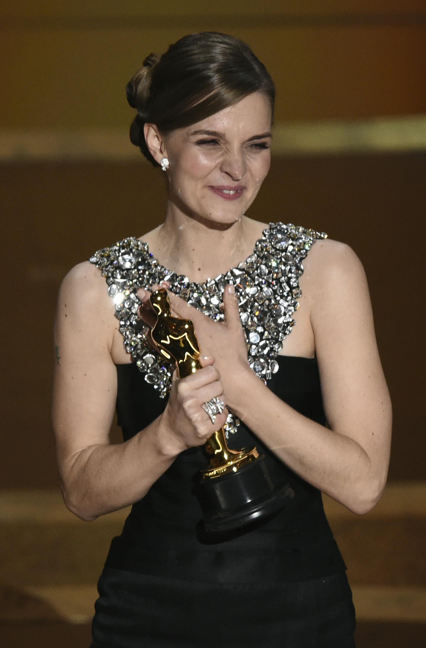 Hildur Guonadottir accepts the award for best original score for "Joker" at the Oscars on Sunday, Feb. 9, 2020, at the Dolby Theatre in Los Angeles. (AP Photo/Chris Pizzello)