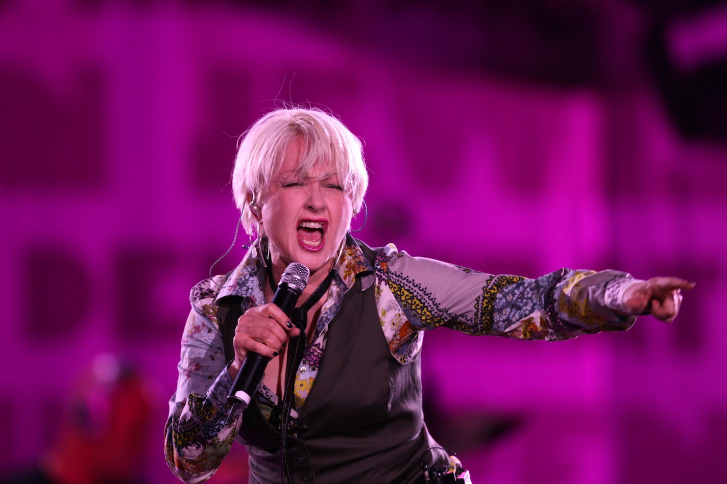 JEFF WHEELER • jwheeler@startribune.com MINNEAPOLIS - 6/9/08 - Cyndi Lauper brought her True Colors tour to Target Center in Minneapolis Monday night. IN THIS PHOTO: ] Cyndi Lauper sang at the start of her Target Center concert Monday night in Minneapolis.