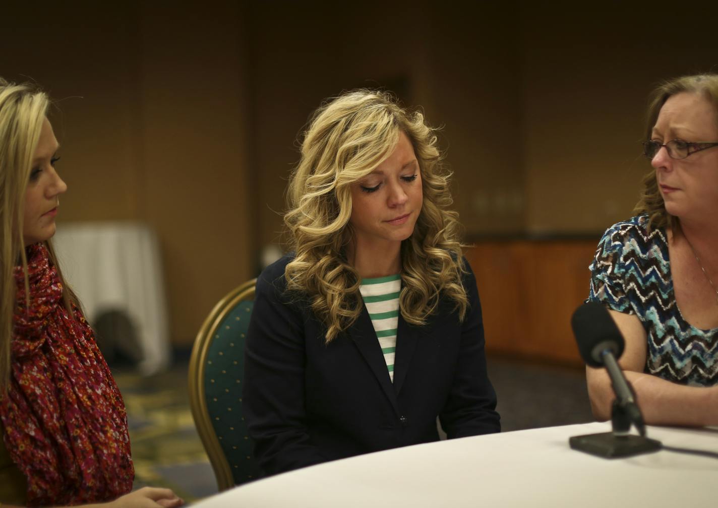 Keri Anne Steger fought back tears as she spoke about her sister, missing girl Kira Trevino, Wednesday, February 27, 2013, at their hotel in Bloomington, Minn. At right is Trevino's mother Marcie Steger and at left her cousin Cassie Guyton. ] (RENEE JONES SCHNEIDER * reneejones@startribune.com)