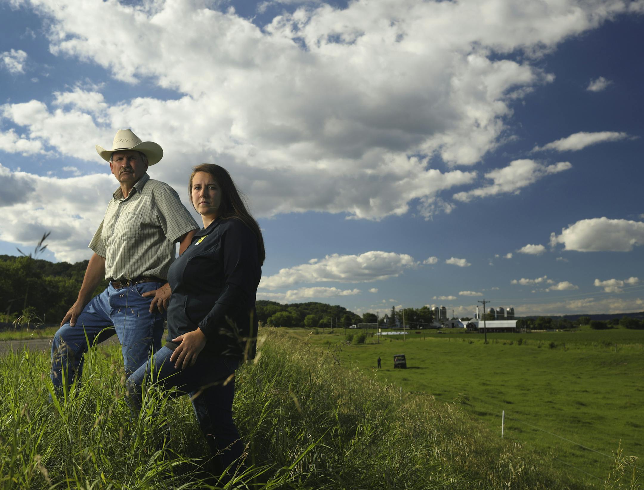 Willard Drysdale with his daughter, Chelsea, who helps run his cattle operation. The field to the right, which is pasture in the foreground, and planted in corn beyond that, would all be buried in dredge sand if the Corps of Engineers has it's way. ] JEFF WHEELER ï jeff.wheeler@startribune.com Willard Drysdale learned last month that the U.S. Army Corps of Engineers has chosen his farm as the best site to dump 7 million cubic yards of sand dredged from the Mississippi River over the next 40