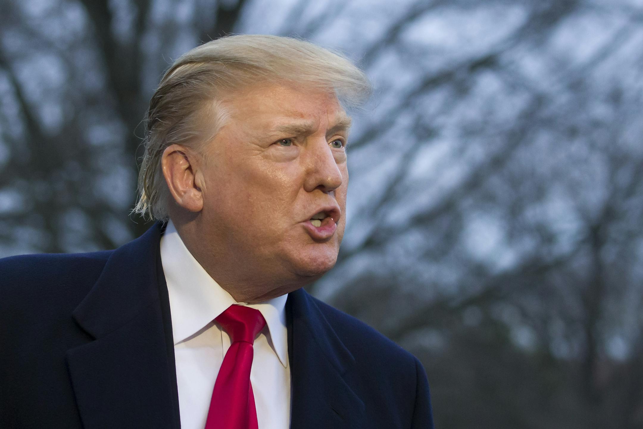 President Donald Trump speaks with the media after stepping off Marine One on the South Lawn of the White House, Sunday, March 24, 2019, in Washington. The Justice Department said Sunday that special counsel Robert Mueller's investigation did not find evidence that President Donald Trump's campaign "conspired or coordinated" with Russia to influence the 2016 presidential election. (AP Photo/Alex Brandon)