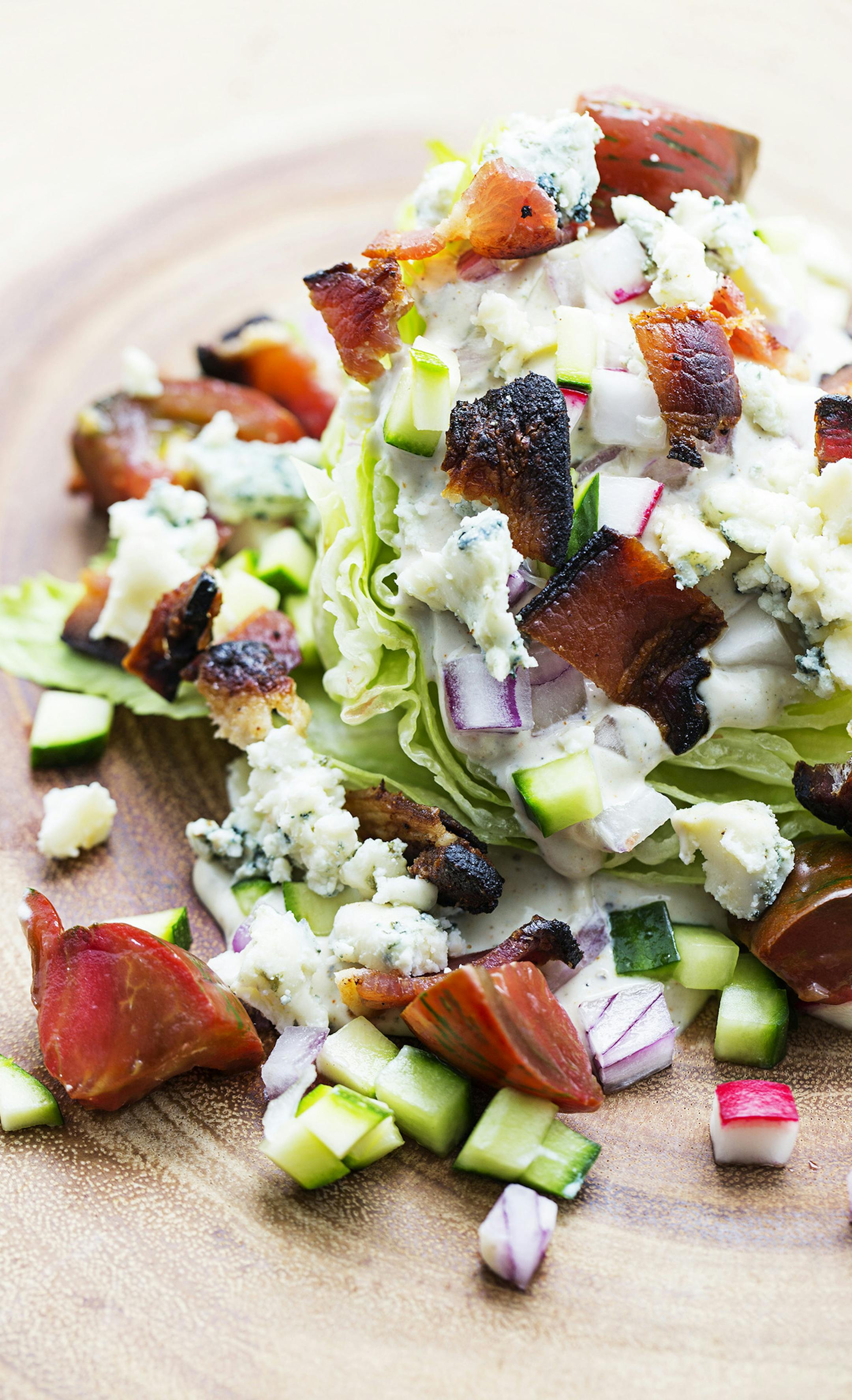 Wedge Salad With Blue Cheese Dressing, Bacon and Pretty Vegetables.