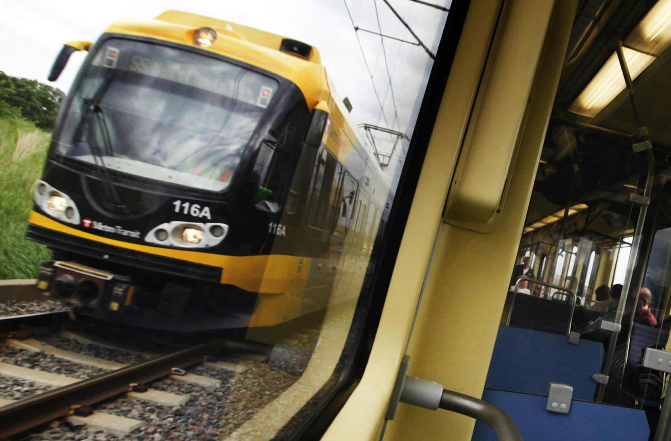 DAVID JOLES ‚Ä¢ djoles@startribune.com -June 2, 2011- Minneapolis, MN- In this photo:] Riders take the light-rail during morning rush hour. Once derided as a ‚Äútrain to nowhere," the Hiawatha light-rail line carries enough riders over 12 miles that it's cheaper to run than city buses. The daily cost per passenger mile of operating the Hiawatha between Bloomington and downtown Minneapolis is nearly half that of metro buses throughout the Twin Cities, according t
