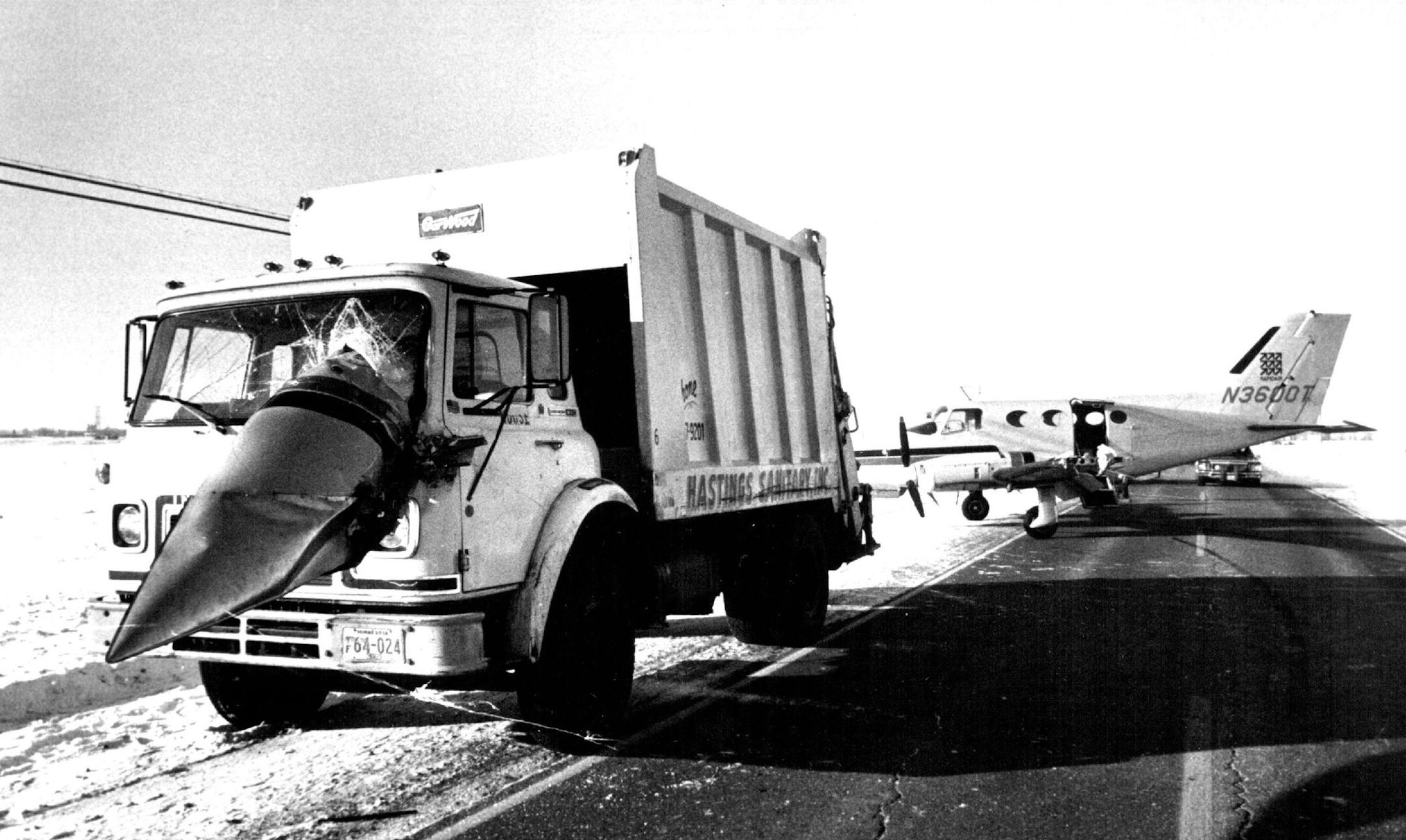 December 8, 1978 Emergency Landing - A twin-engine air cargo plane startled commuters and grazed a trash compacter truck this morning when it made a successful emergency landing in the westbound lane of Hwy. 35, about 3 miles west of Hastings. Neither the pilot, Glenn E. Carpenter, 28, Burnsville, nor the truckdriver, Robert C. Knoll, 40, rural Welch, Minn., was hurt, authorities said. Knoll saw the plane starting to land and pulled his truck to the shoulder before diving to safety from the pass