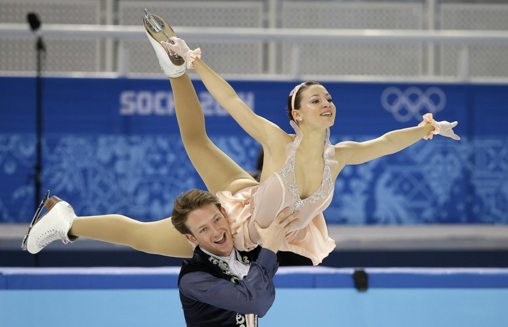 Tanja Kolbe and Stefano Caruso of Germany compete in the ice dance free dance figure skating finals at the Iceberg Skating Palace during the 2014 Winter Olympics, Monday, Feb. 17, 2014, in Sochi, Russia.
