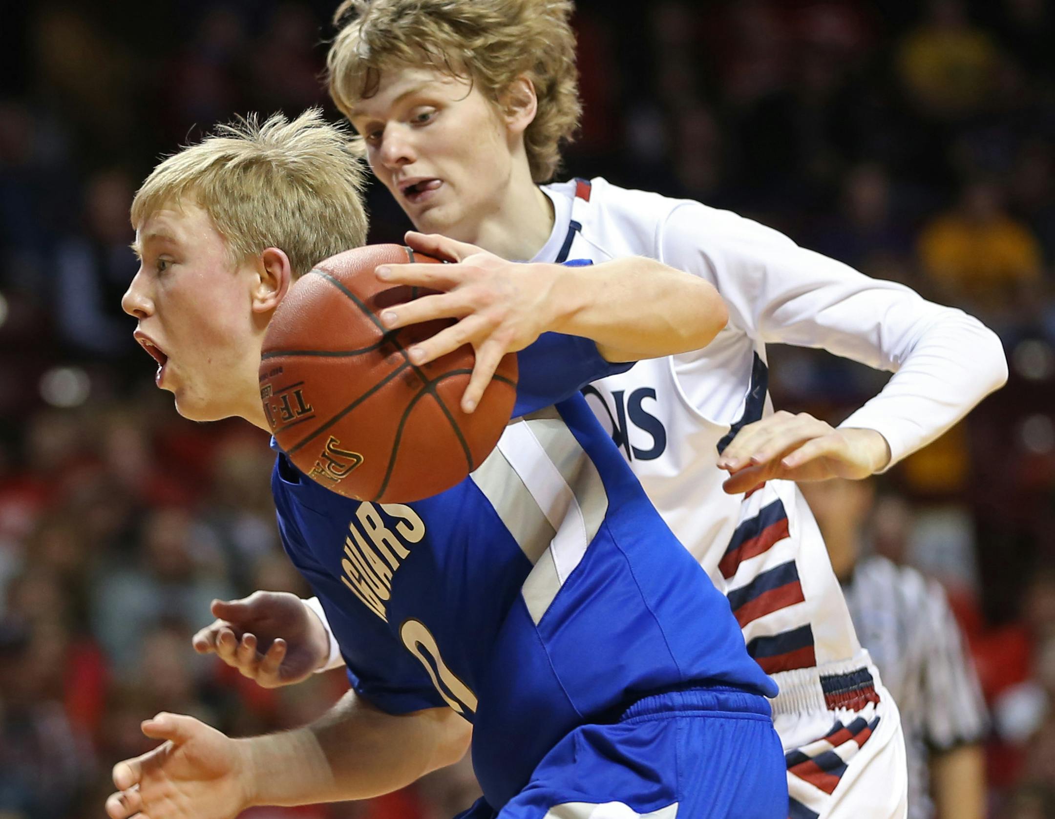 (left to right) Belgrade-Brooten-Elrosa's Tanner Heinsius drove to the basket as he was defended by Park Christian's Duncan Hannestad.] Boys Basketball Tournament, Park Christian vs Belgrade-Brooten-Elrosa, Class 1A game at Williams Arena, 3/13/14. Bruce Bisping/Star Tribune bbisping@startribune.com Tanner Heinsius, Duncan Hannestad/roster